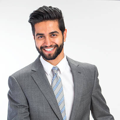 Home indian business man smiling going in for a hand shake